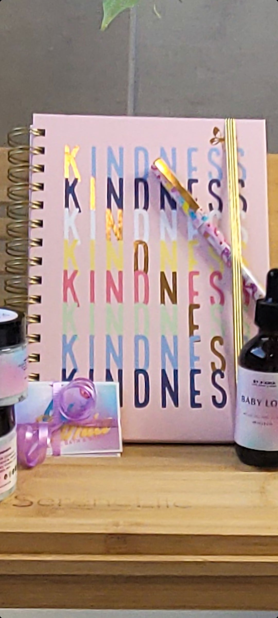 Journal - Pink with kindness written in the front, with a matching pen