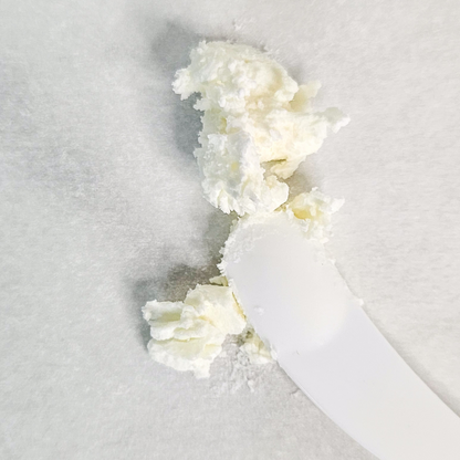 Close-up of the dense, creamy texture of by A’amia Eczema Butter.