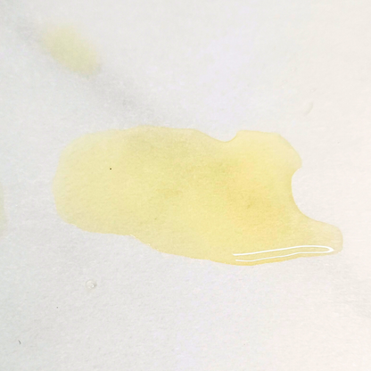 Close-up of by A’amia Eczema Oil showing its smooth, lightweight texture and minimal residue.