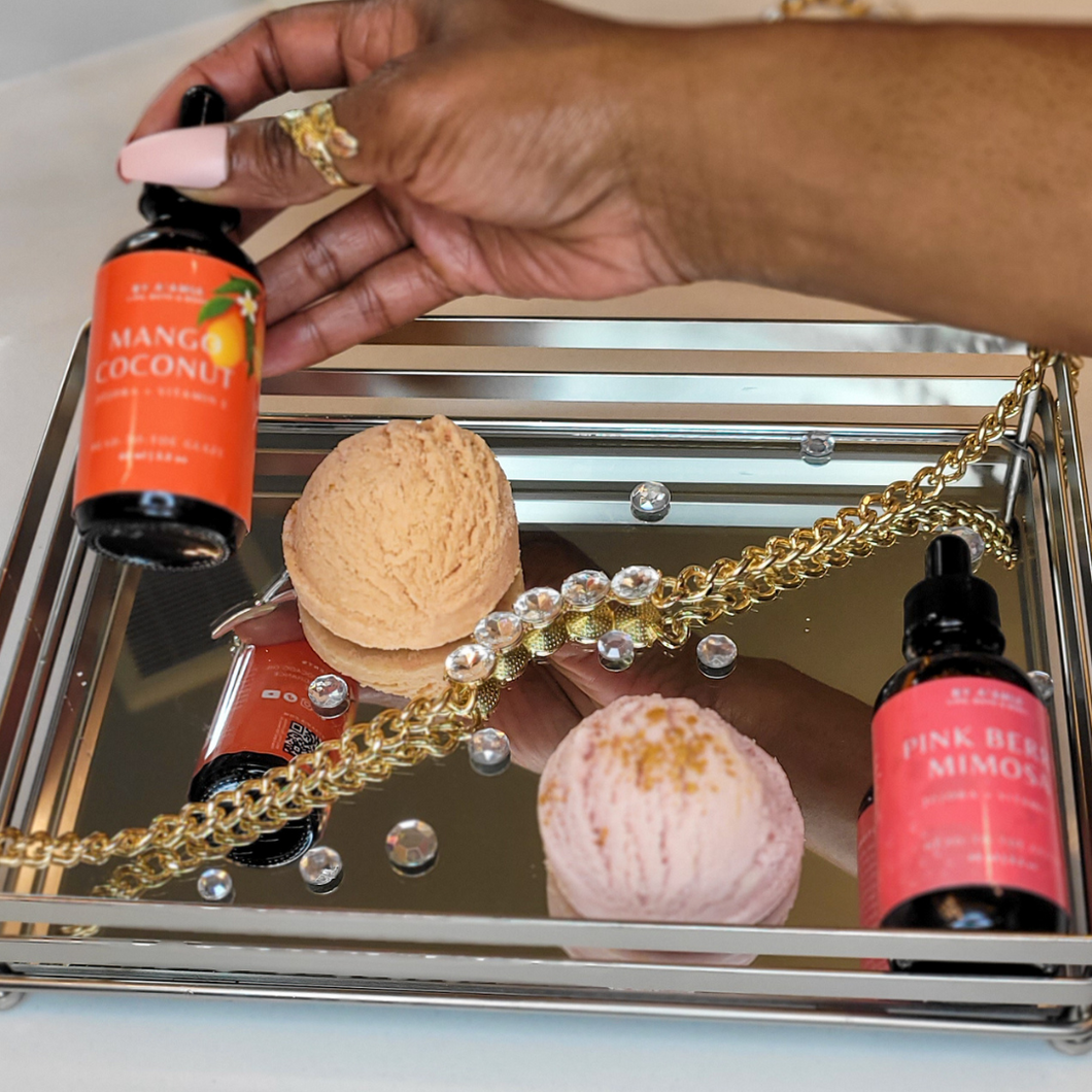 Indulge in the Glow & Soak Bundle. Immerse yourself in a luxurious bath with Milk Bath Scoops, while the Head-to-Toe Glaze body oil nourishes and hydrates. Relax and let the soothing scents and moisturizing benefits rejuvenate your skin. A perfect self-care escape.