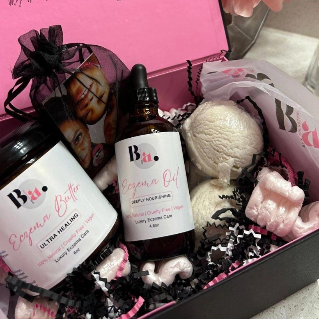 Bath bundle to calm, sooth and heal eczema in a luxury black tuxedo box with a hot pink interior with an affirmation printed inside.